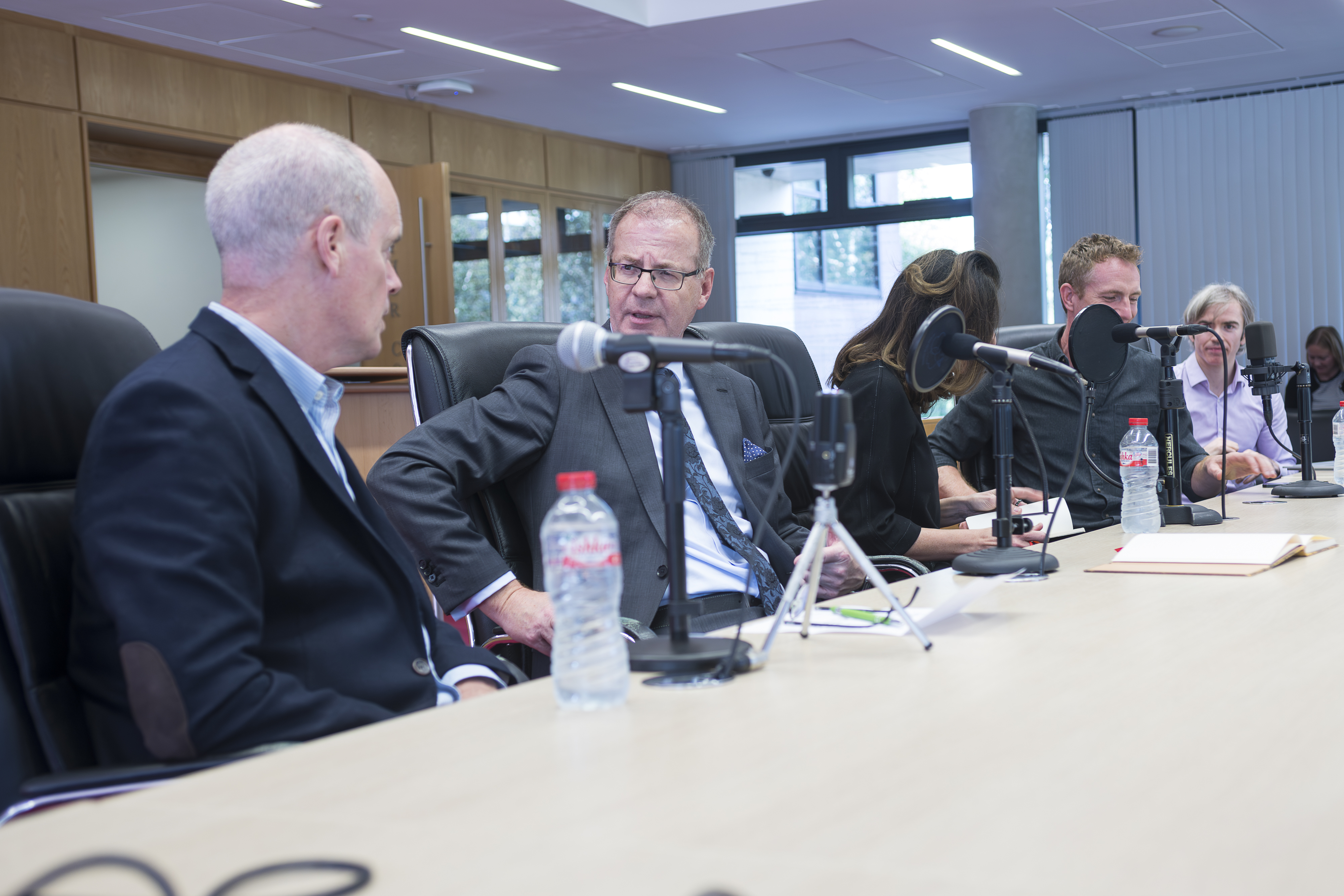 Panel discussion with microphones